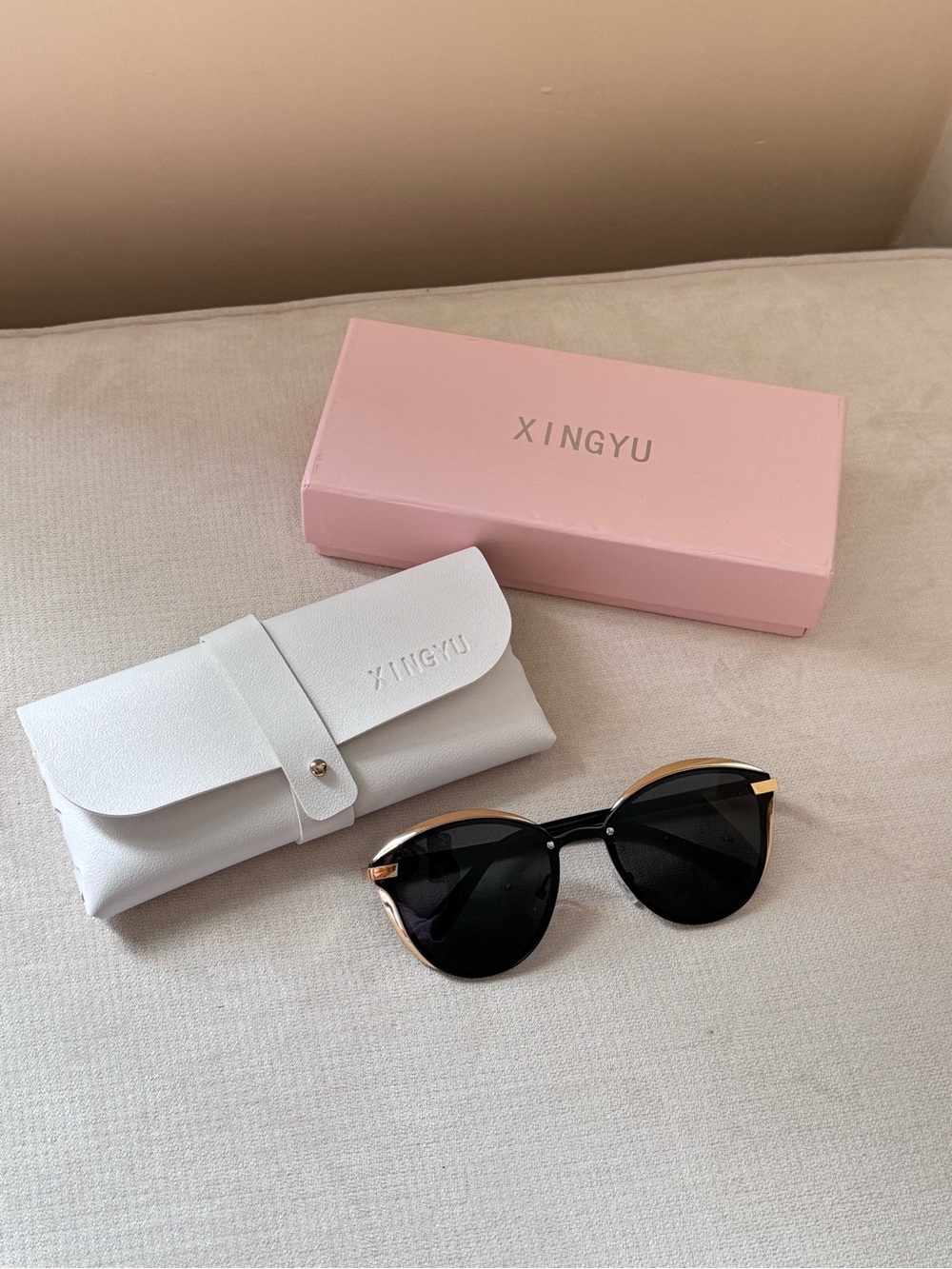 Women's Black Frame Sunglasses with Gold Accents